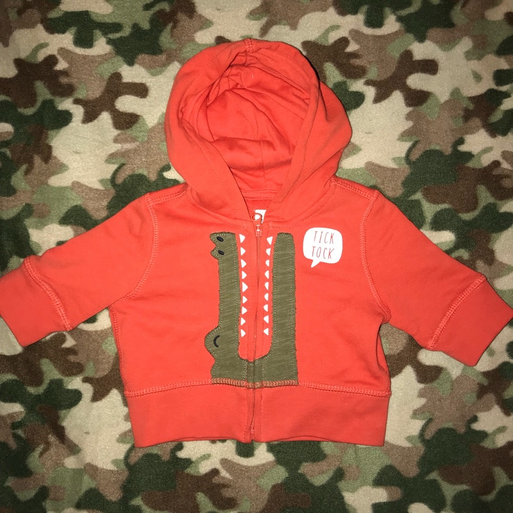 Three-quarter length zip hoodie.